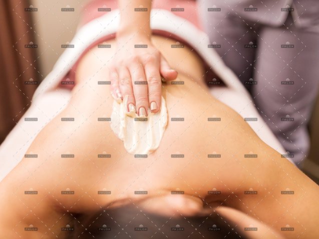 demo-attachment-386-woman-having-back-massage-with-cream-at-spa-PFCWZ34